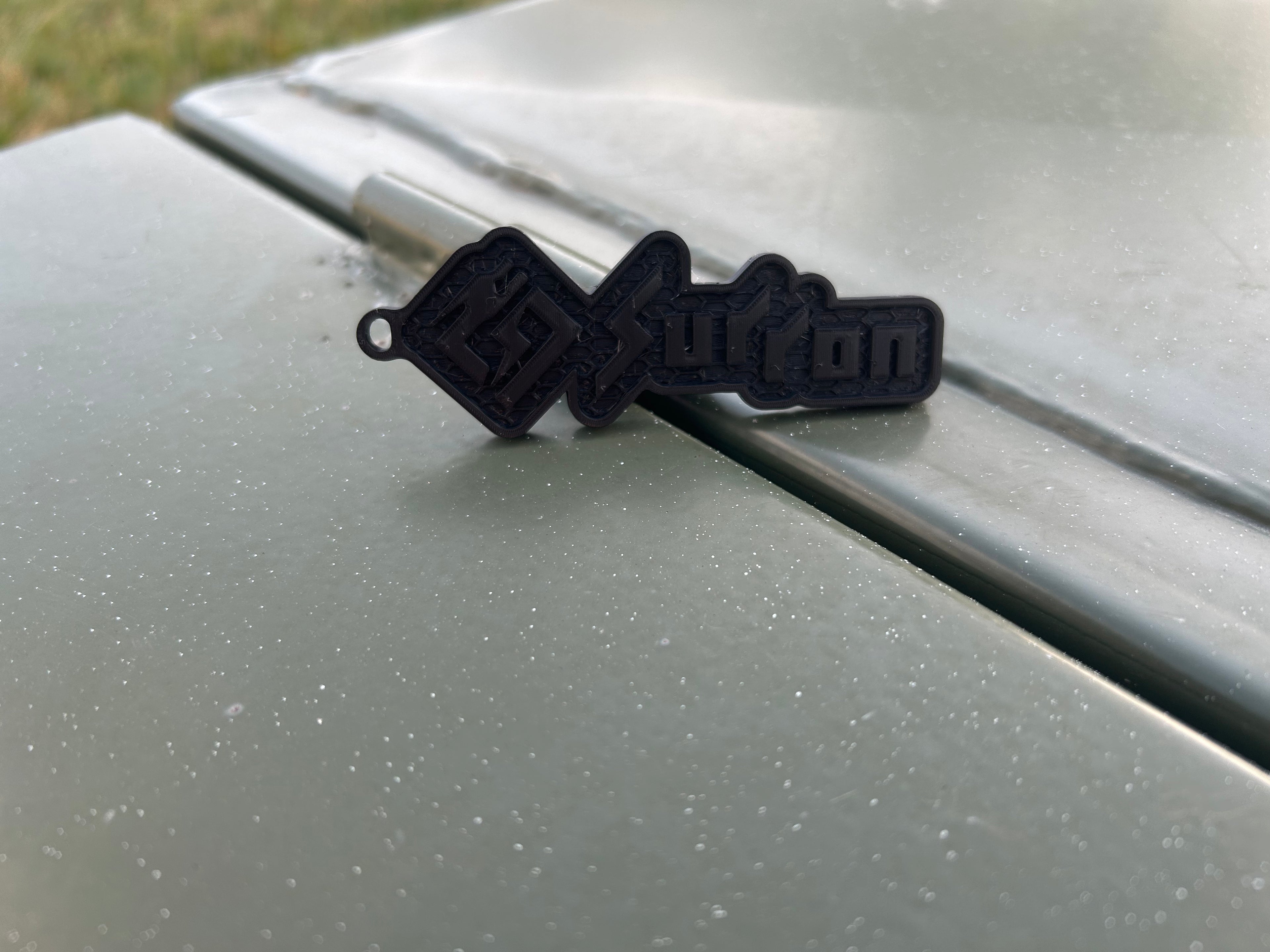 Full black Surron key chain
