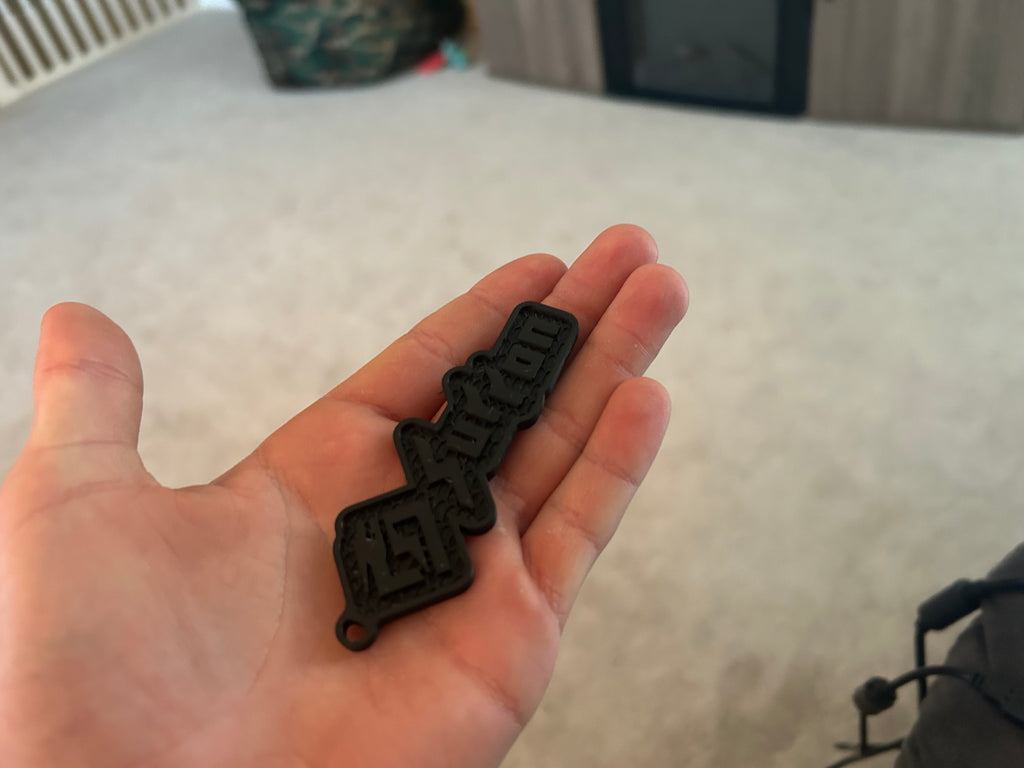 Full black Surron key chain